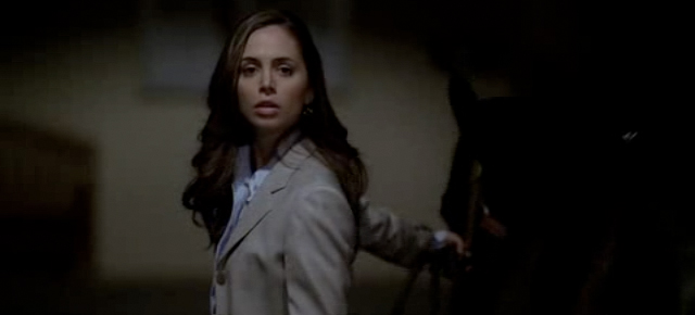 Screenshot from an episode of Dollhouse featuring Eliza Dushku