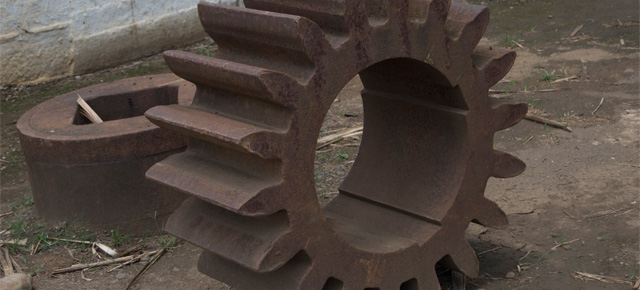 A large, steel, industrial gear