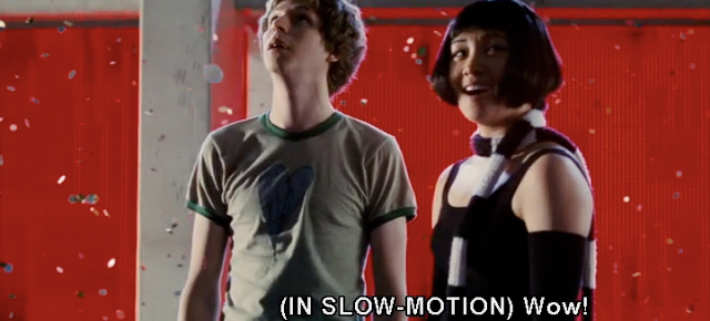 A frame from Scott Pilgrim vs. the World featuring Michael Cera, Ellen Wong and the caption: (In slow-motion): Wow!