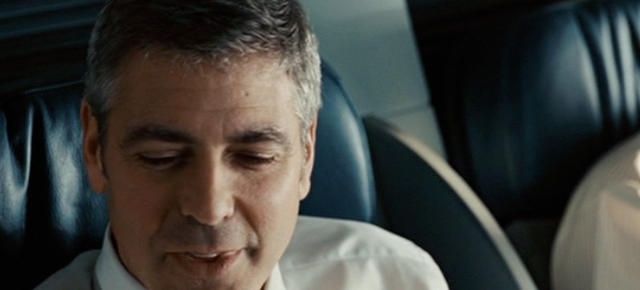 A screenshot from Up in the Air (2009) featuring George Clooney