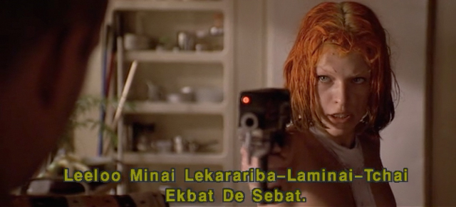 A frame from The Fifth Element featuring Milla Jovovich pointing a gun at the camera and her character's full name in the caption